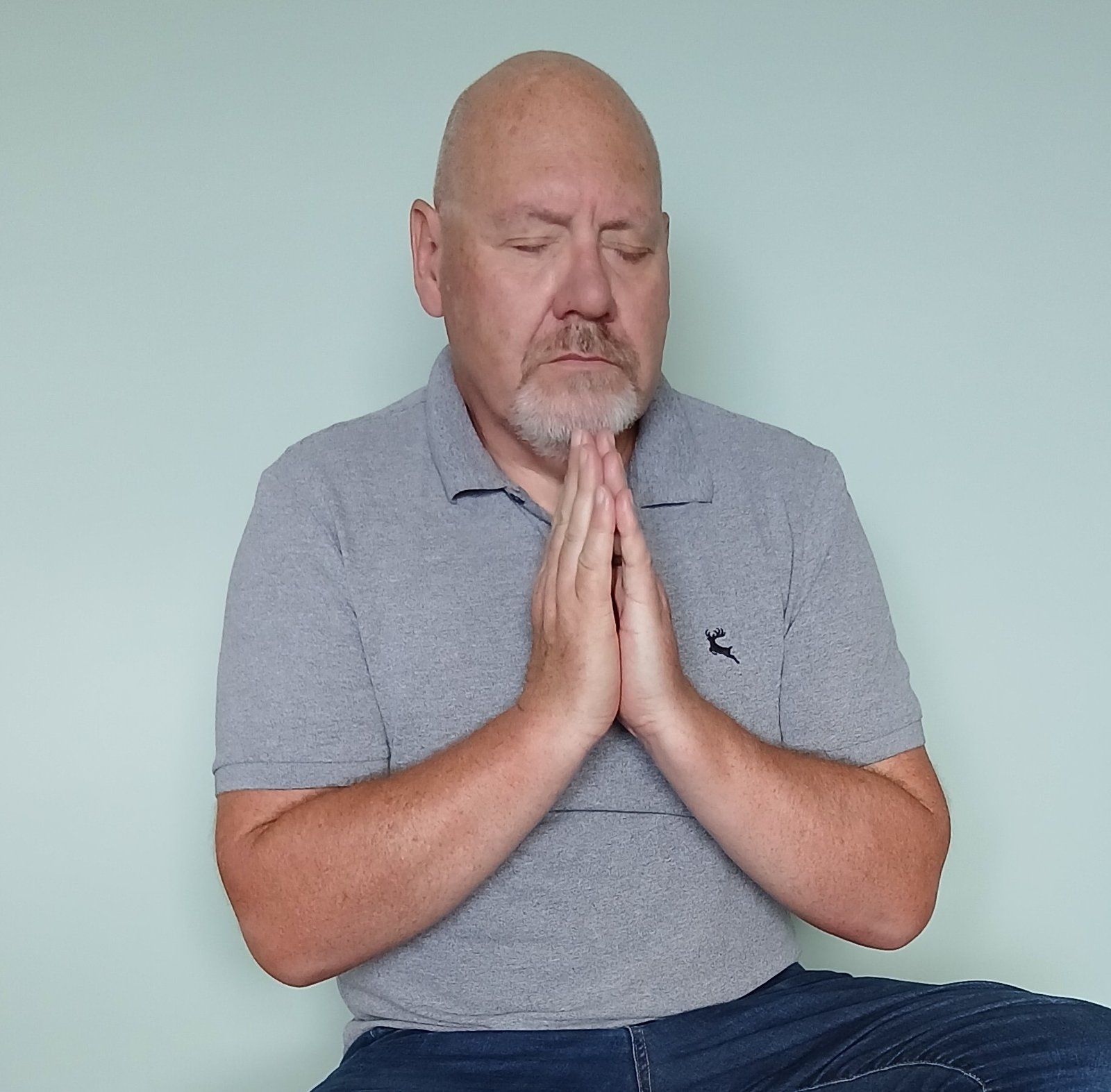 Andrew in Gassho Meditation position